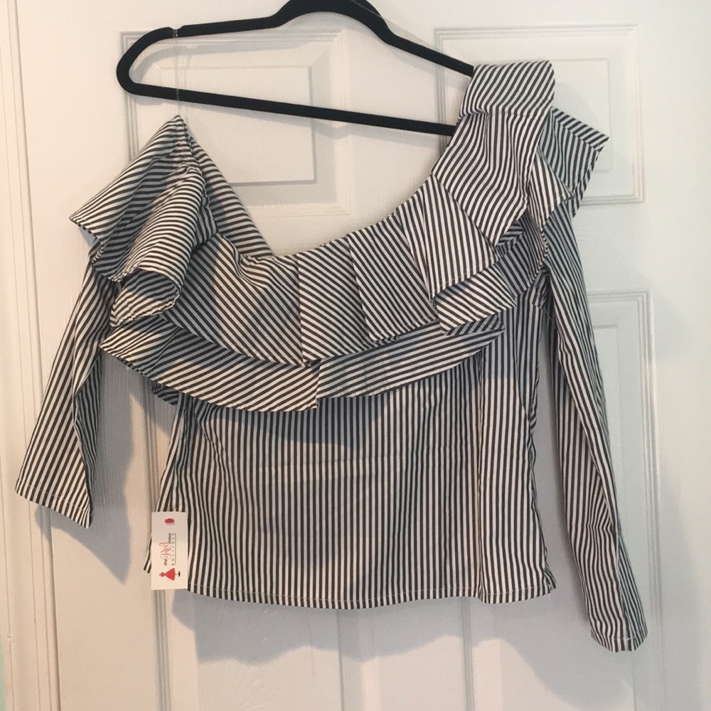 One cold shoulder long sleeve top